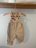 Hema - leuke beige salopette - 62