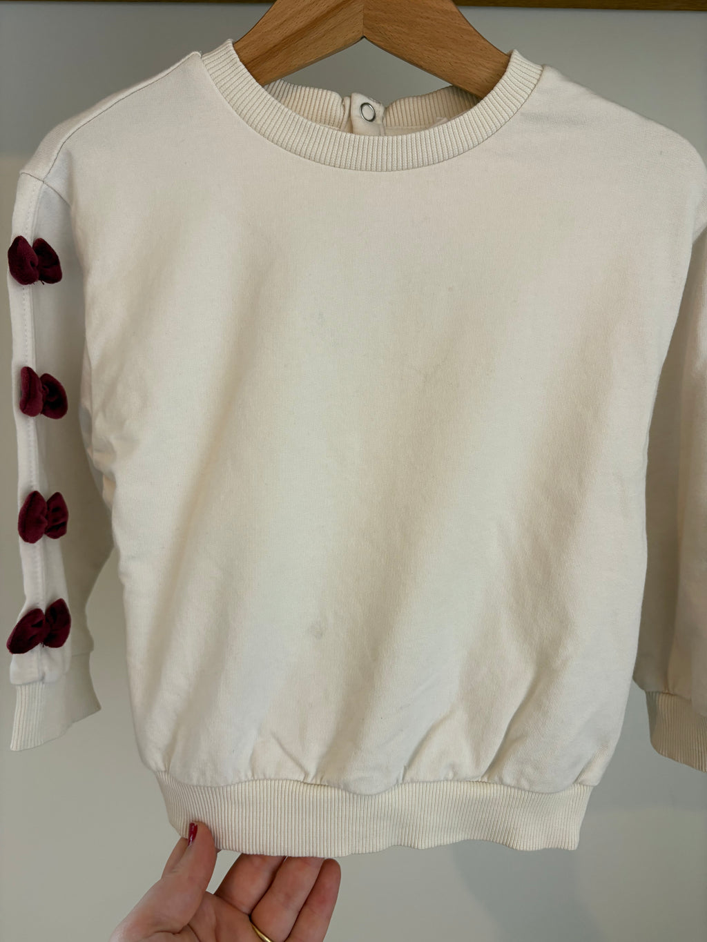 JBC - witte sweater roze strikjes - 92