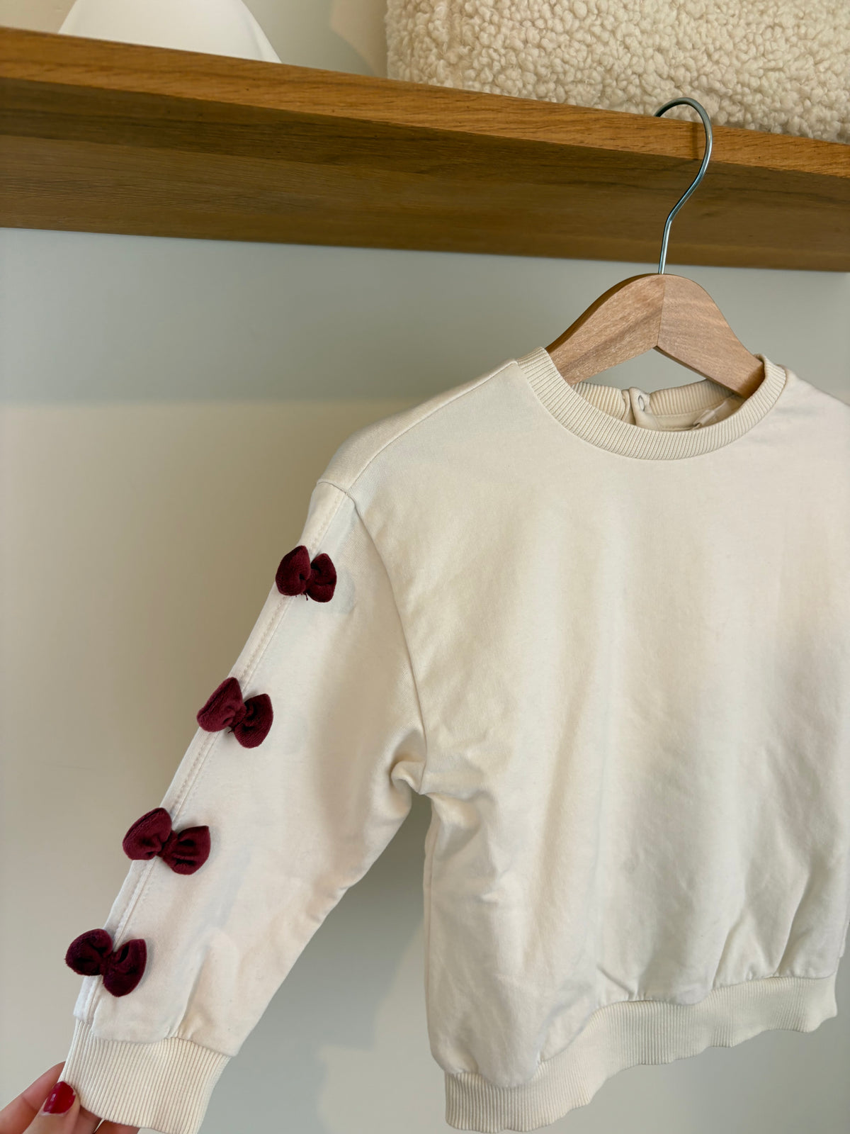 JBC - witte sweater roze strikjes - 92