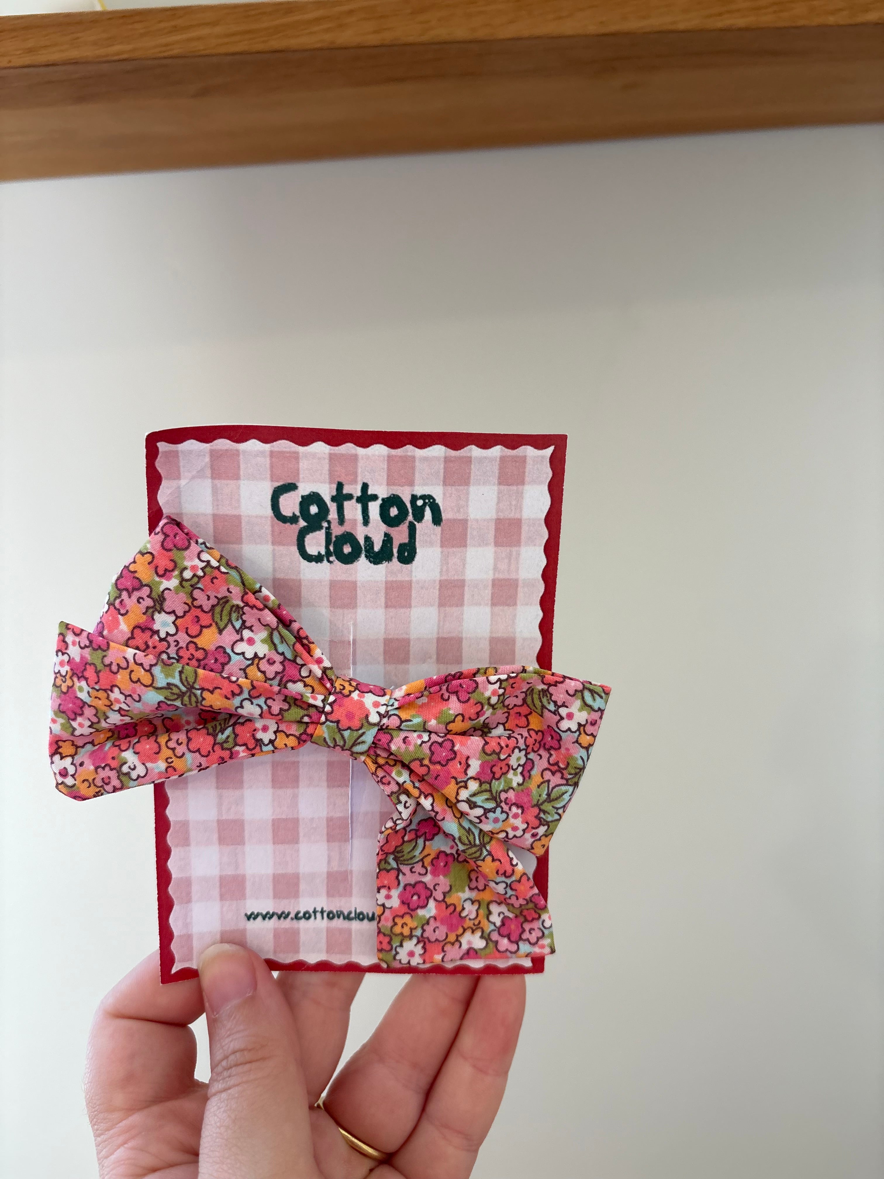 Cotton Cloud - meerkleurig strikje roze